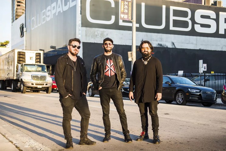 David Sinopoli, Davide Danese, and Coloma Kaboomsky of Club Space standing in the street in front of the venue