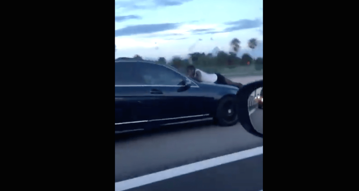 Video: Man Hangs Onto Hood of Car Speeding in I-95 Express Lane