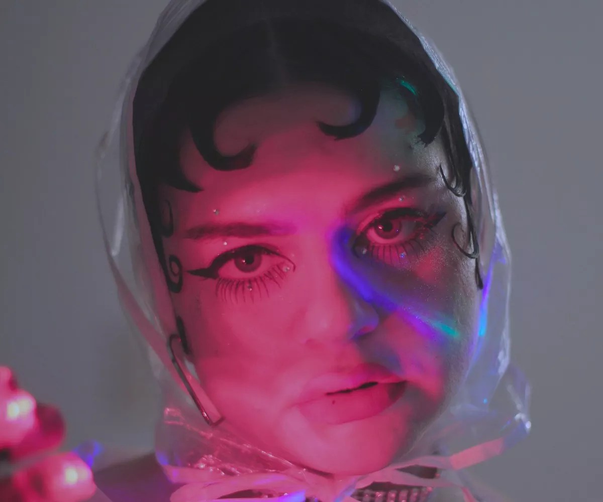 As JuJu Pie, Layla Bessito Brings Haunting, Drag-Inspired Costumes and an Angelic Voice