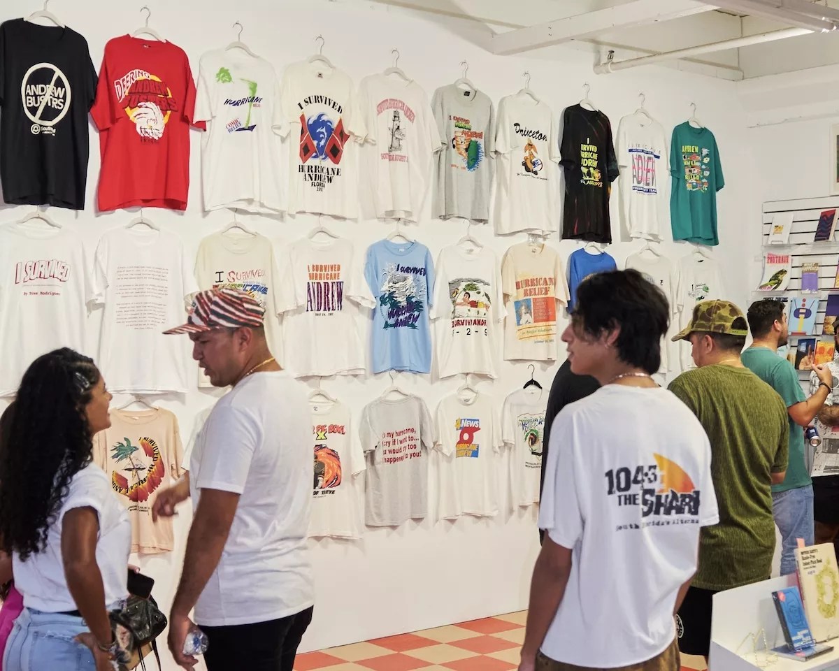 attendees view the Hurricane Andrew memorabilia exhibit