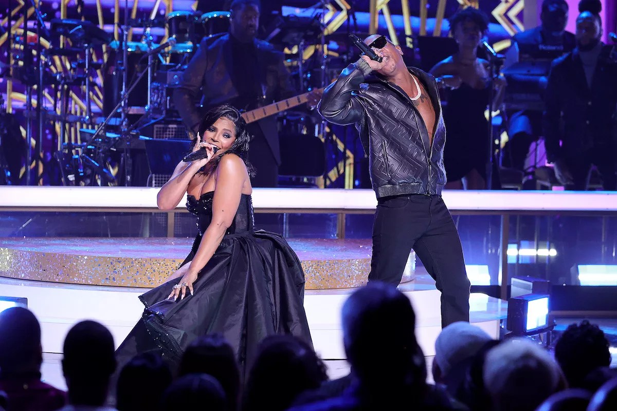 Ashanti and Ja Rule performing on stage at the 2021 Soul Train Awards.