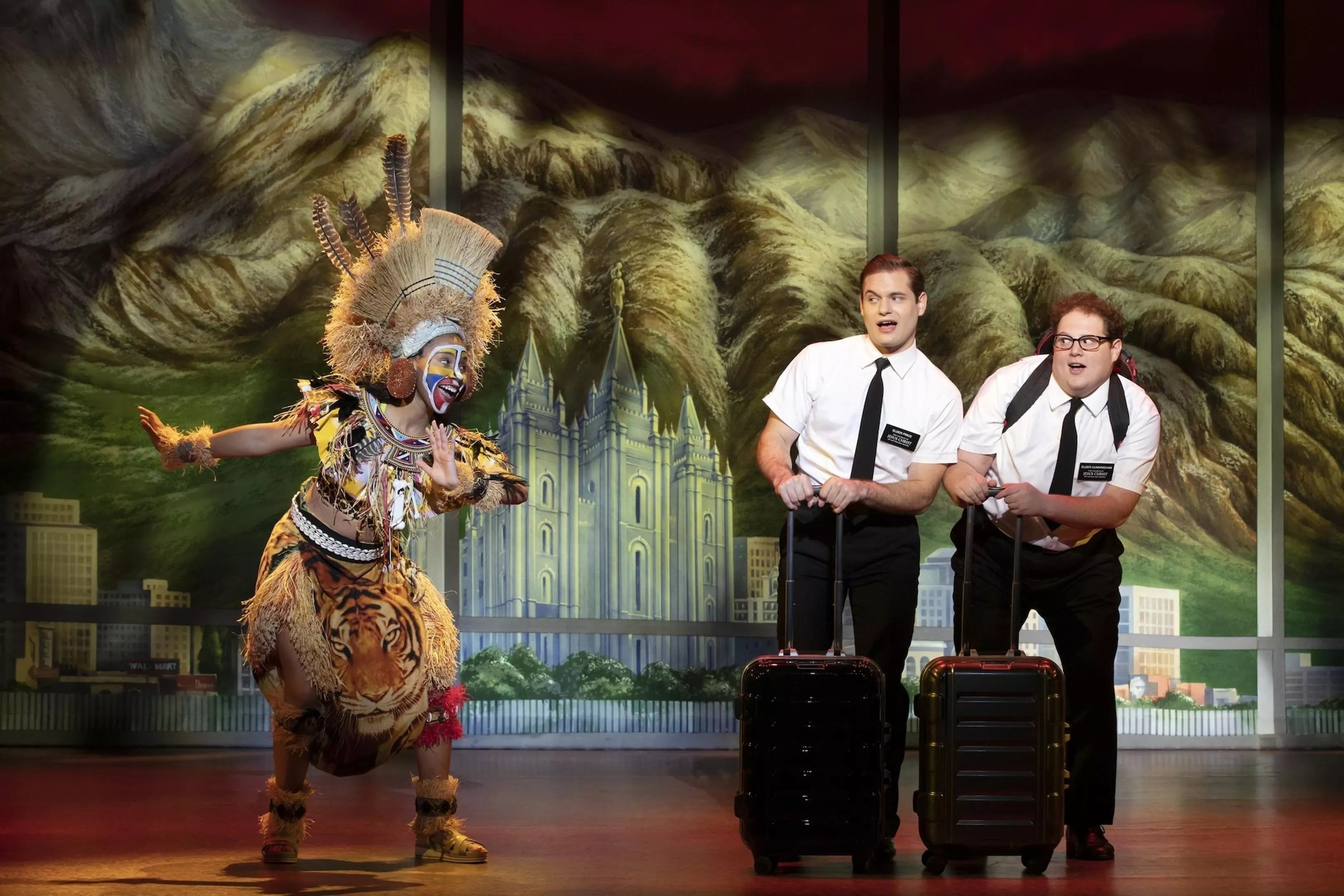 The three cast members of the Broadway musical The Book of Mormon