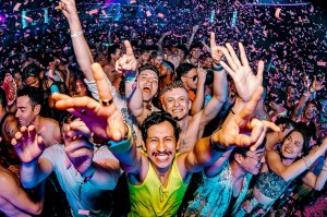 Partygoers throw their hands in the air during Dreamland NYE in Miami