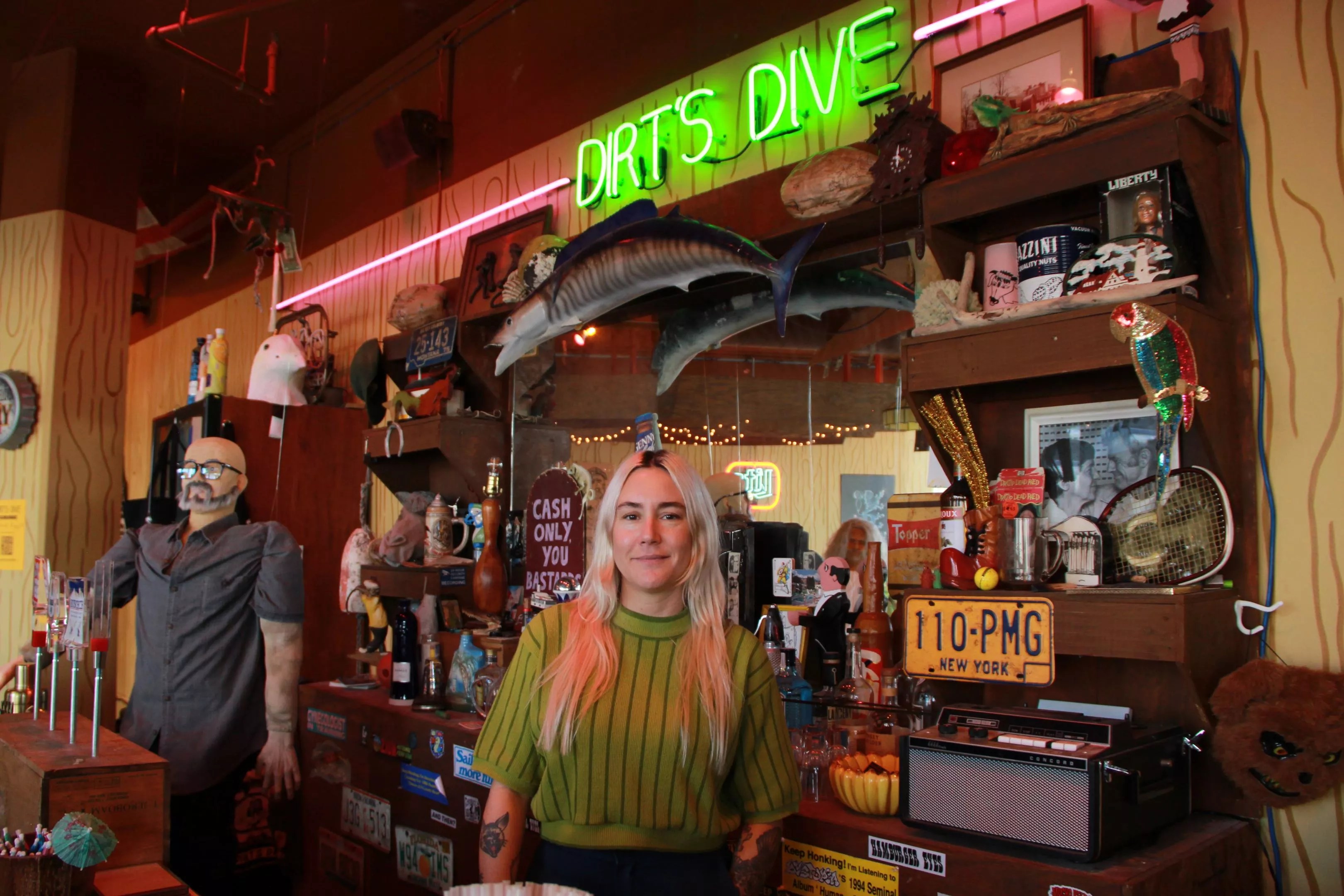 Kelly Breez in front of her art installation, Dirt's Dive