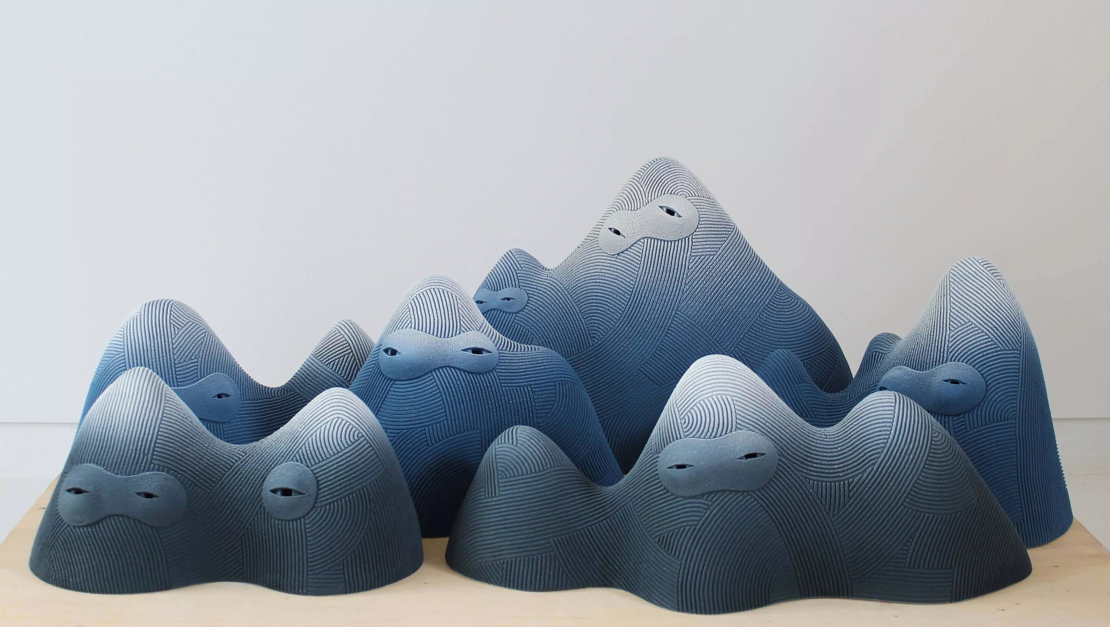 Mountain sculptures with eyes