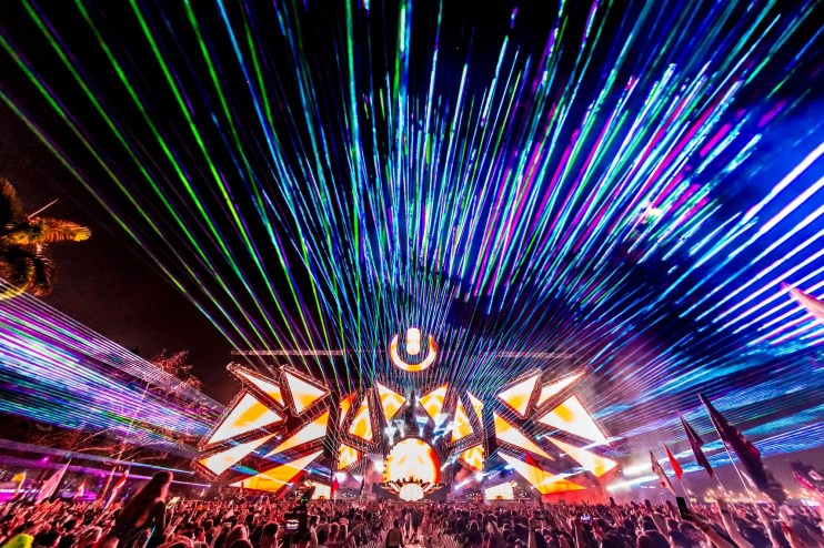 Laser lights shoot through the night sky at Ultra Music Festival