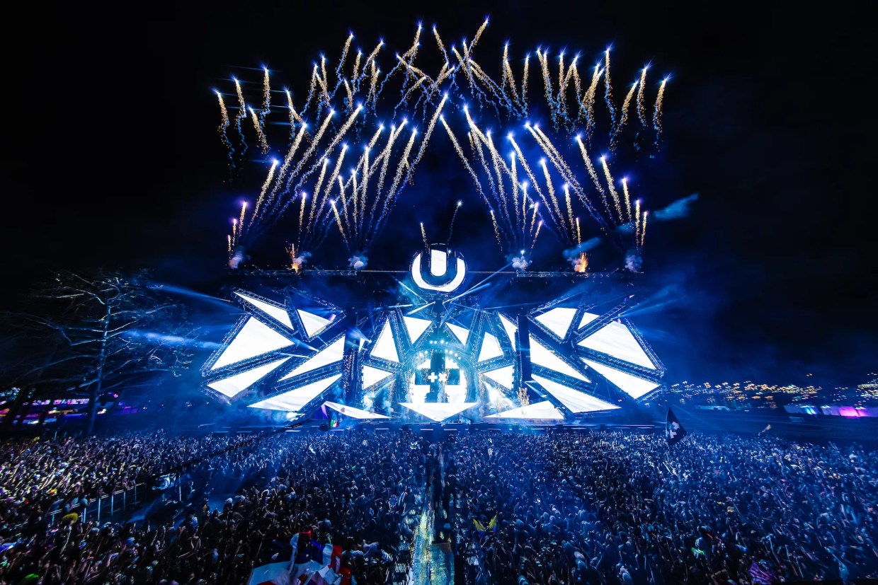 Main Stage at Ultra Music Festival with enormous LED panels and fireworks shooting above it
