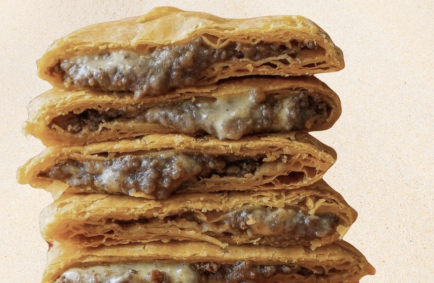 Jamaican patties stacked on each other