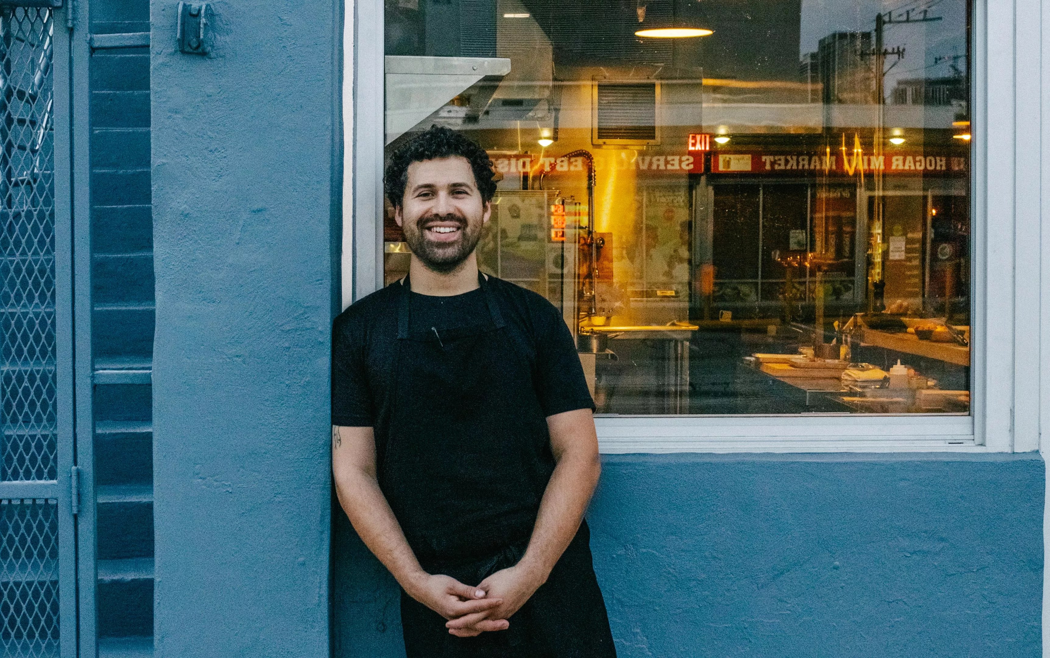 Man in front of building