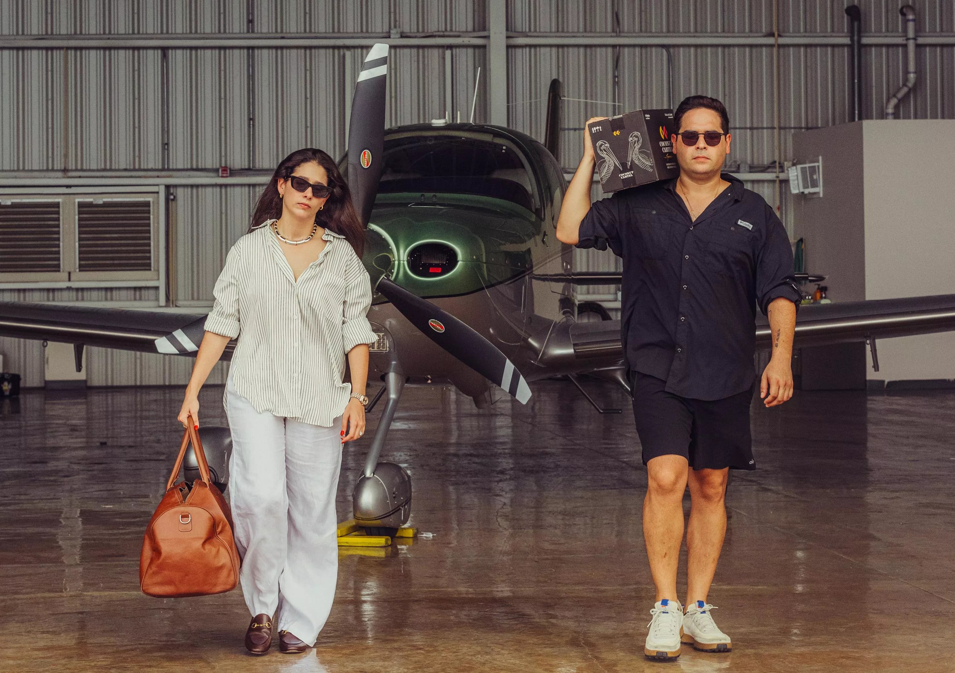Two people at a distillery
