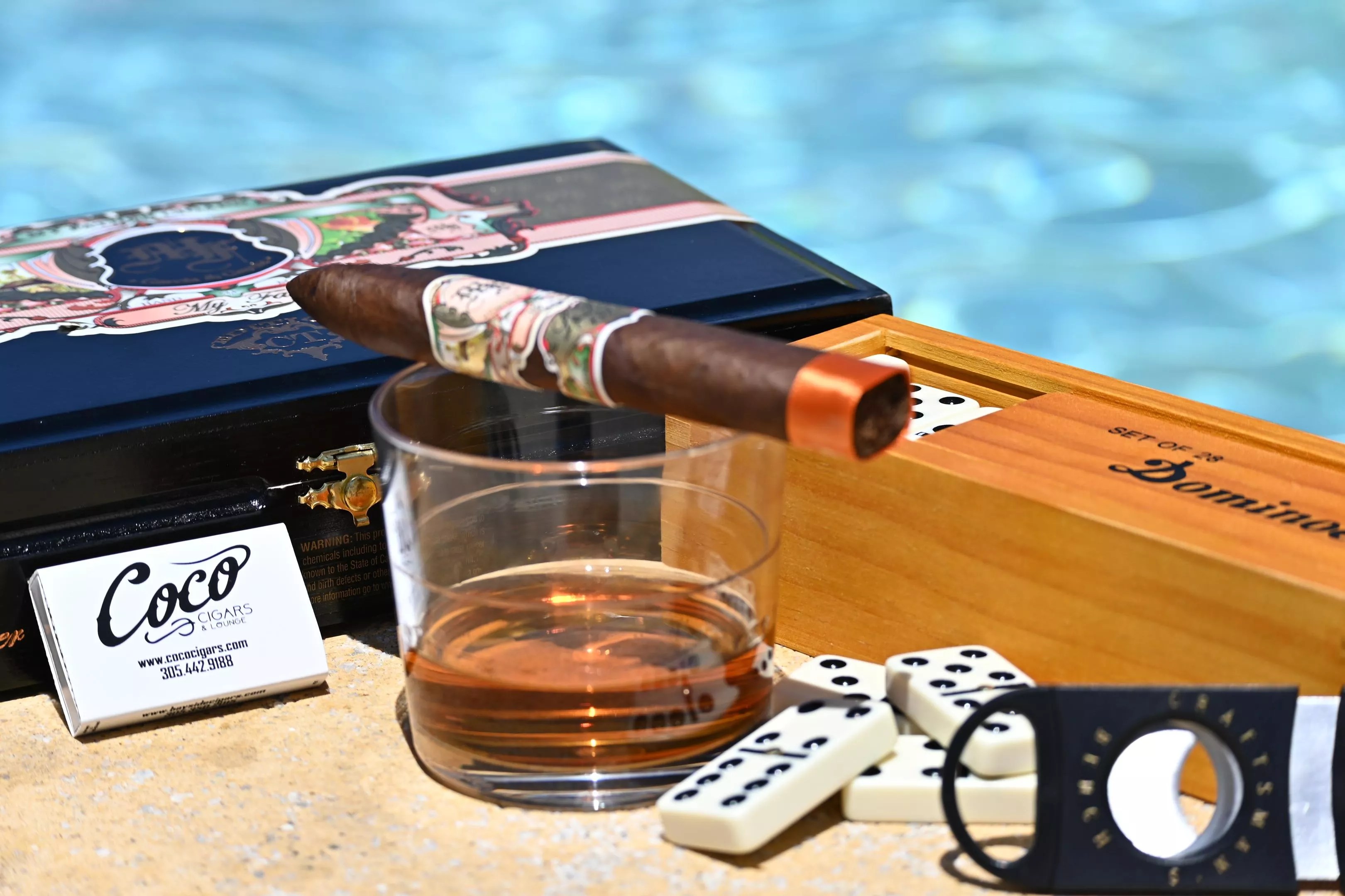 A cigar near a pool