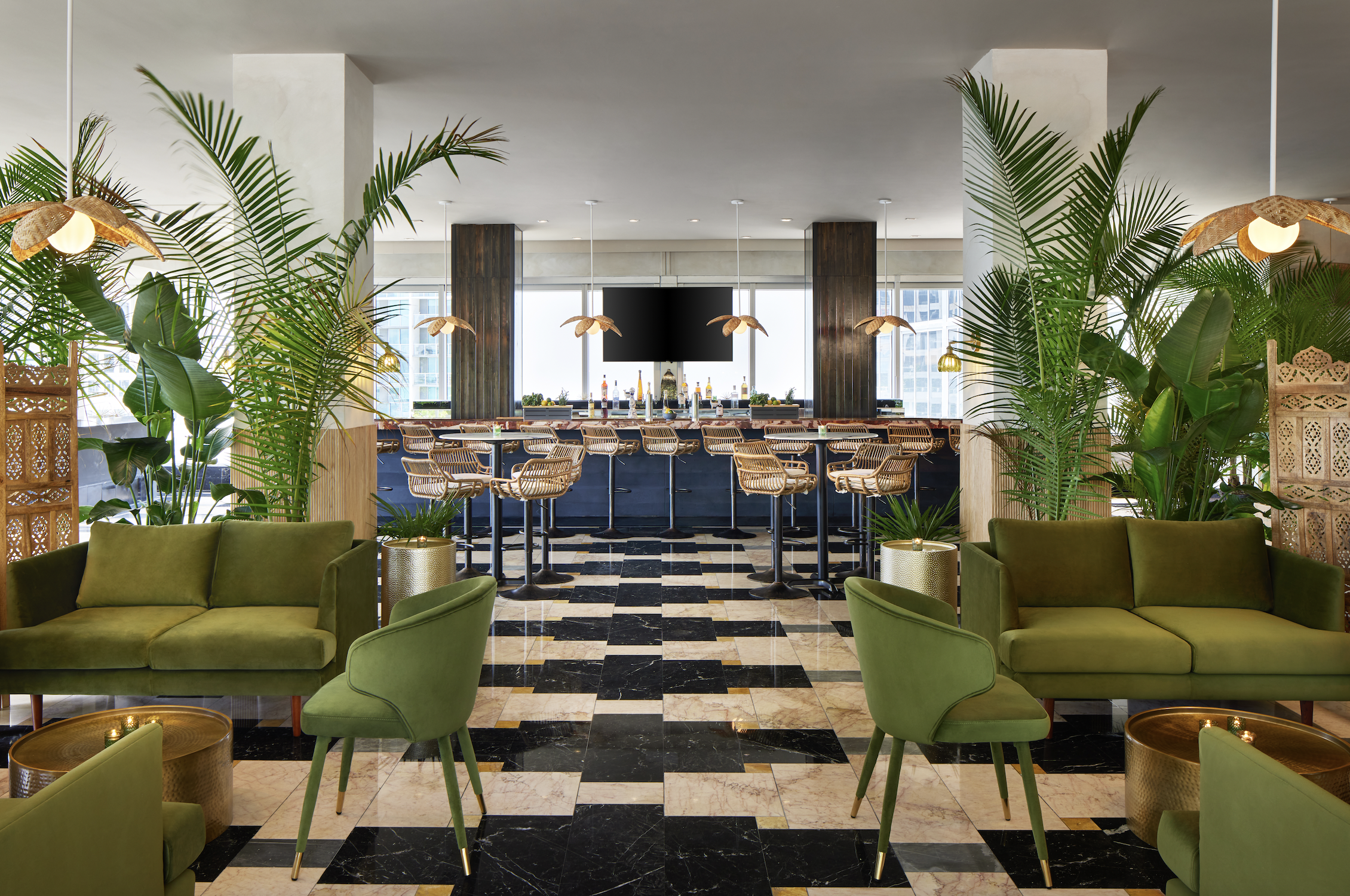 an earthy dining room with greenery