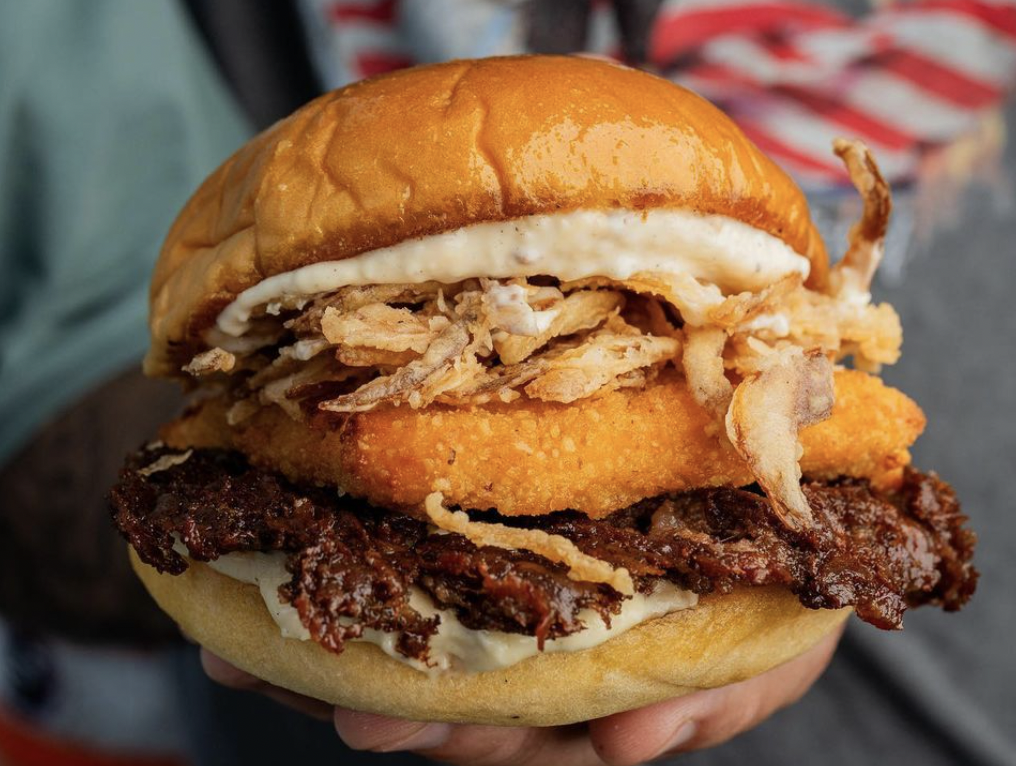 a burger with toppings