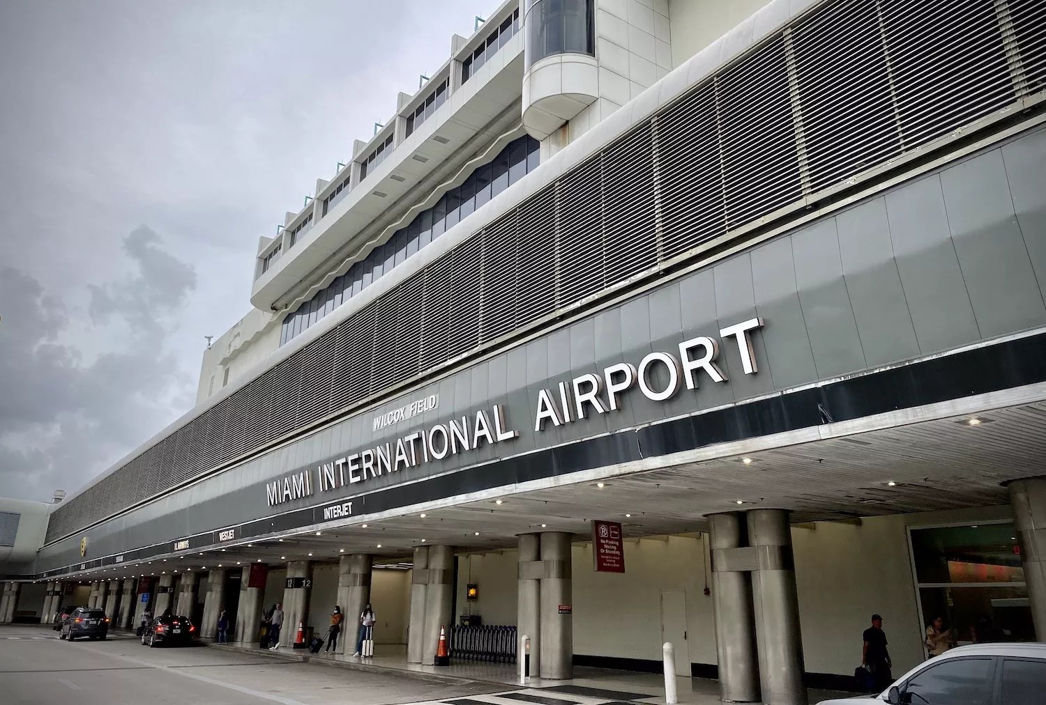 2021 photo of the exterior of Miami International airport, showing the sign