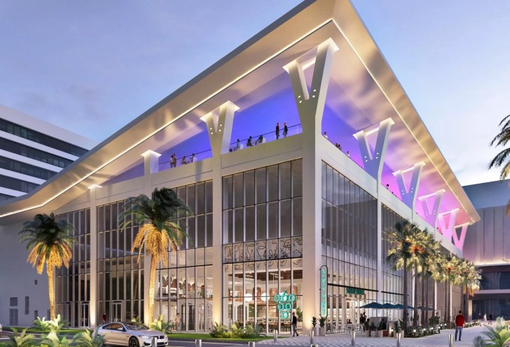 a giant building with a rooftop restaurant