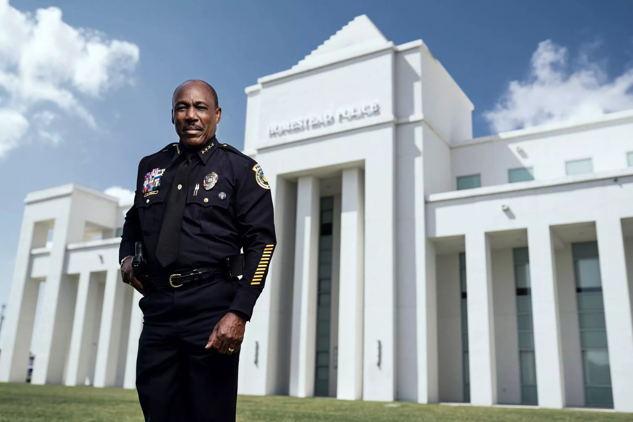 Homestead Police Chief Alexander E. Rolle Jr. stands in front of the Homestead Police Department building