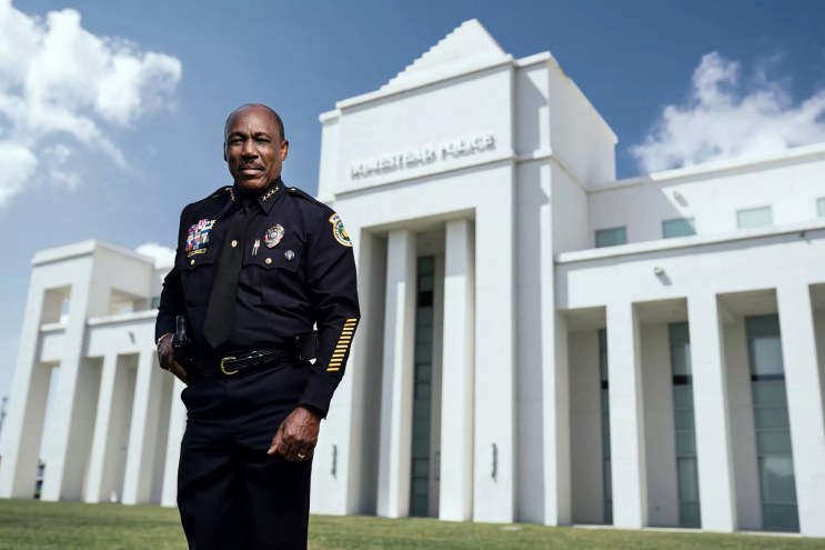 Homestead Police Chief Alexander E. Rolle Jr. stands in front of the Homestead Police Department building