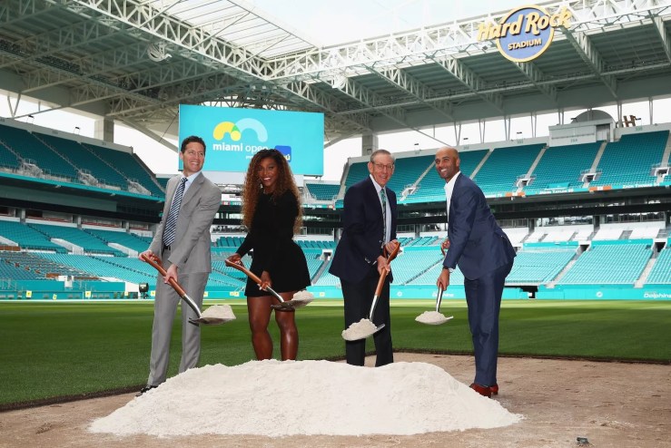 Mark Sharpiro, WME/IMG Co-President; Serena Williams; Stephen Ross, Miami Dolphins owner; and James Blake, tournament director pose at Hard Rock Stadium in a groundbreaking ceremony for the future home of the Miami Open tennis tournament