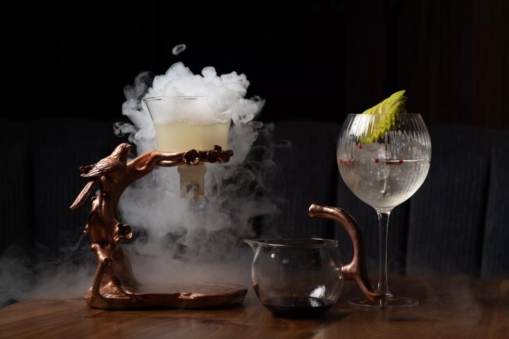 a cocktail with smoke