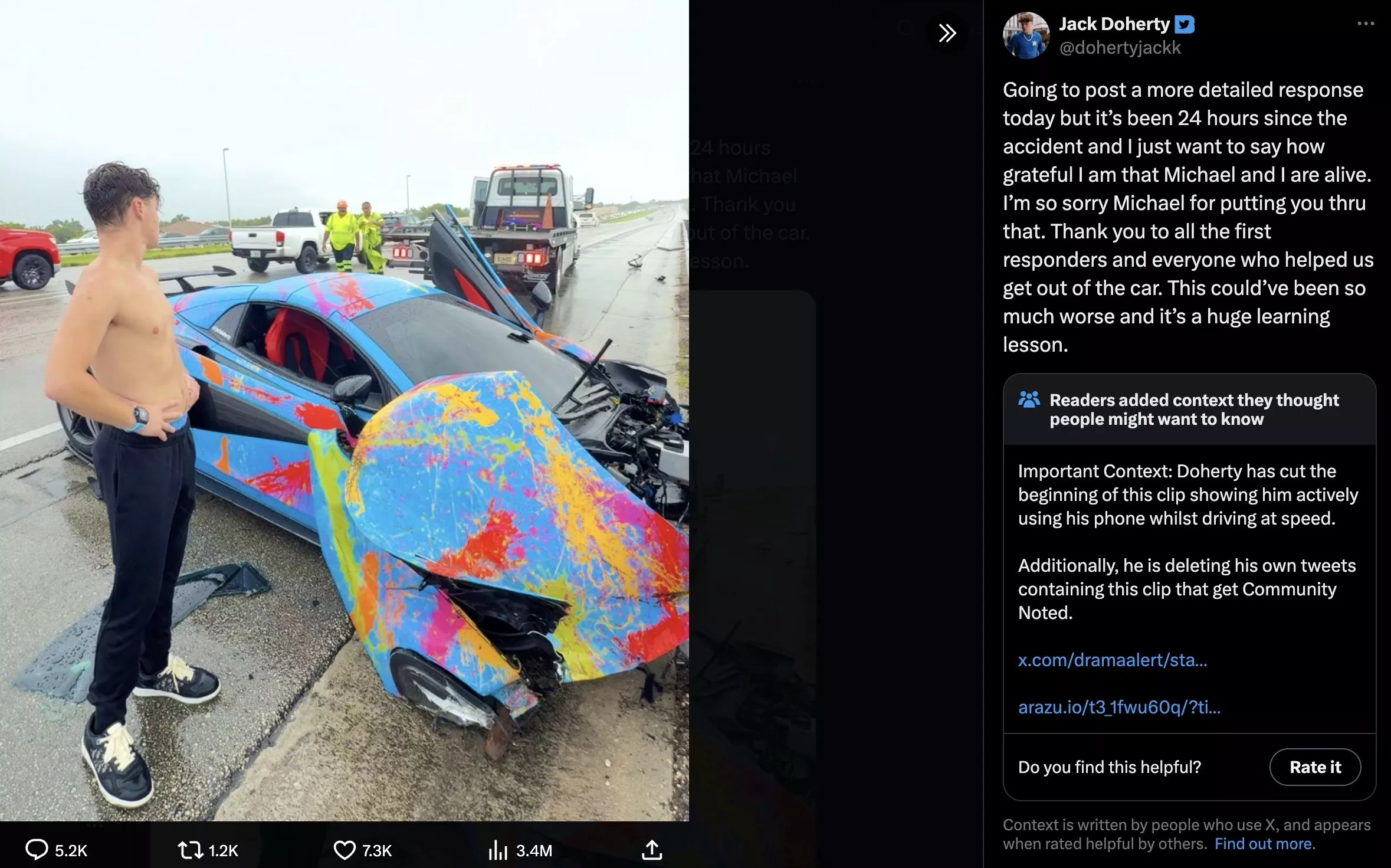 Jack Doherty stands shirtless next to his wrecked McLaren