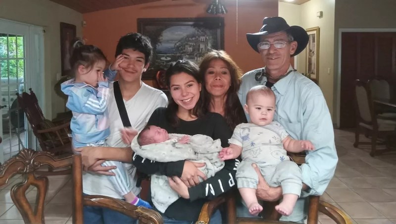 The Cueli family poses for a photo