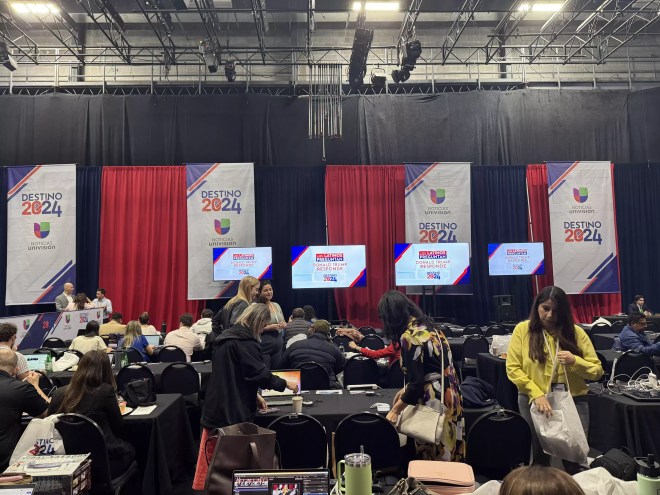 reporters inside the media center at the Unvision townhall
