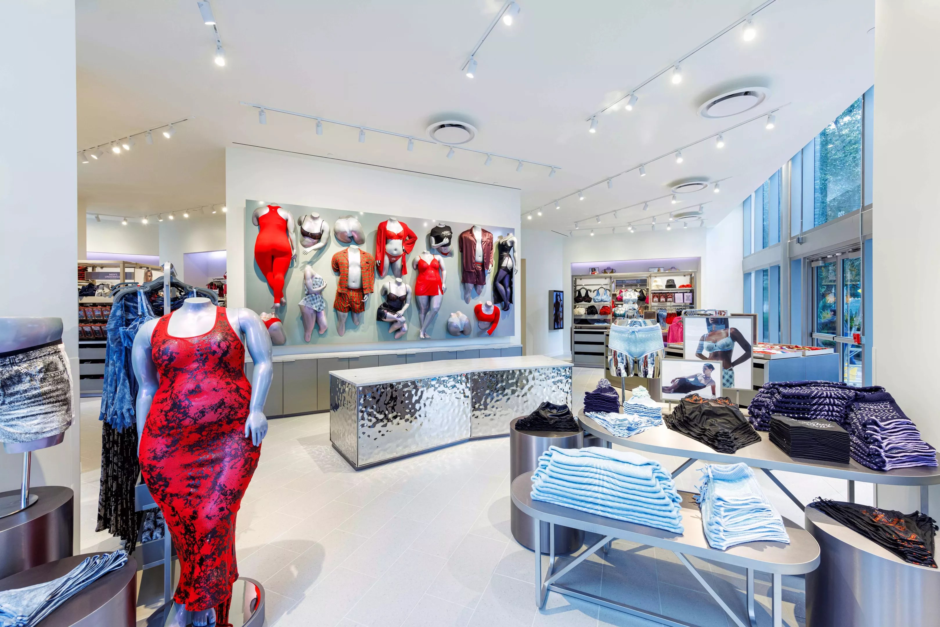 Interior design of Savage X Fenty's Miami store featuring bold colors and modern decor