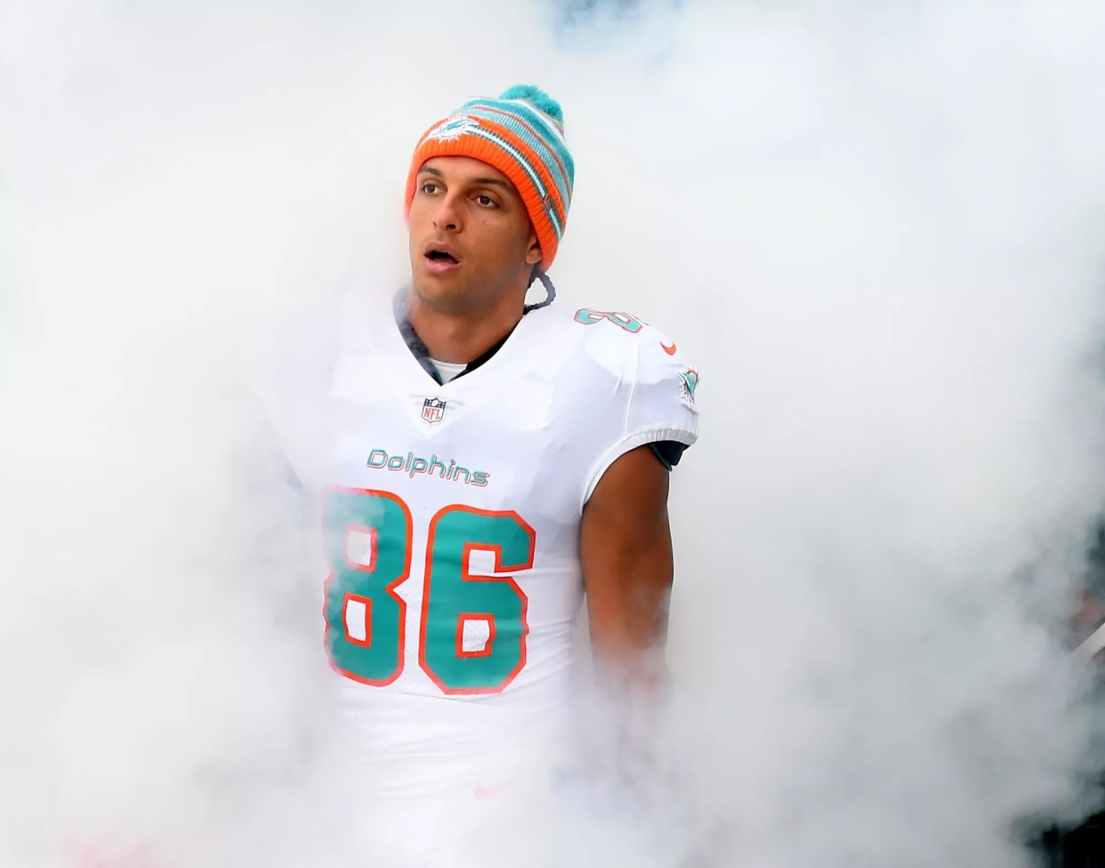 Mack Hollins #86 of the Miami Dolphins takes the field during player introductions before the game against the Carolina Panthers at Hard Rock Stadium on November 28, 2021, in Miami Gardens, Florida.