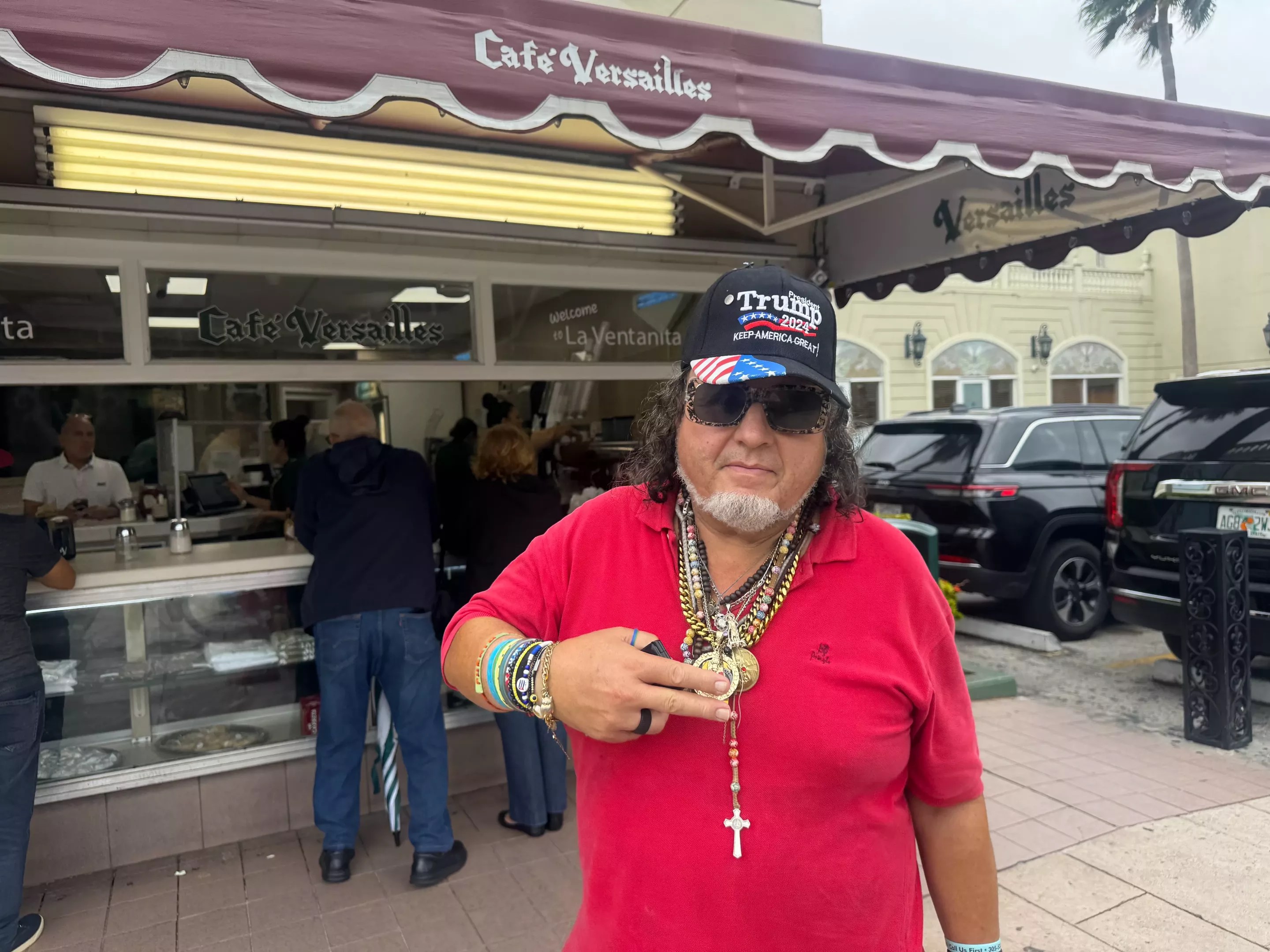 a man outside a restaurant