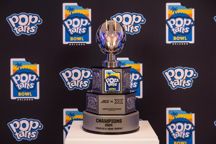 a press room photo of the 2024 Pop-Tarts Bowl trophy, complete with Pop-Tarts