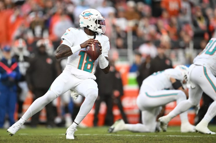 Tyler Huntley #18 of the Miami Dolphins looks to pass against the Cleveland Browns in the first quarter at Huntington Bank Field on December 29, 2024 in Cleveland, Ohio.