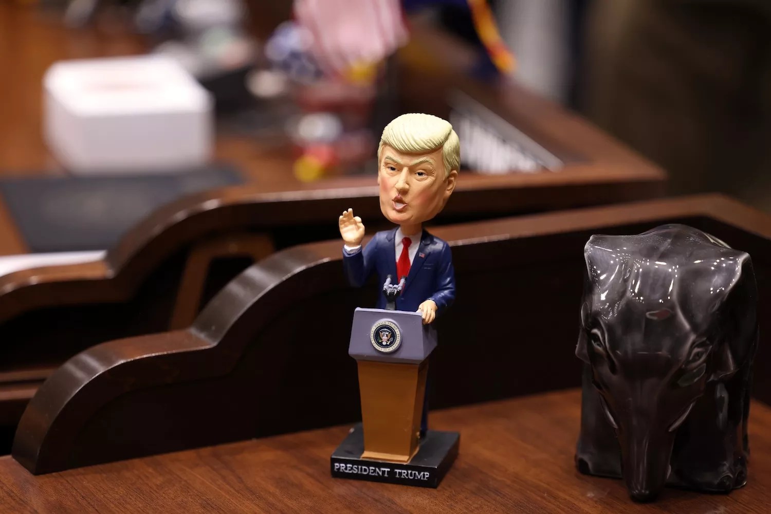 A bobblehead of President Donald Trump on the floor of the Arizona House of Representatives on opening day of the 57th legislature in Phoenix, Arizona.