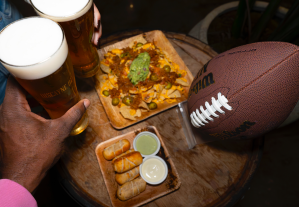 hands and beer and football
