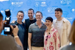 people posing for photos