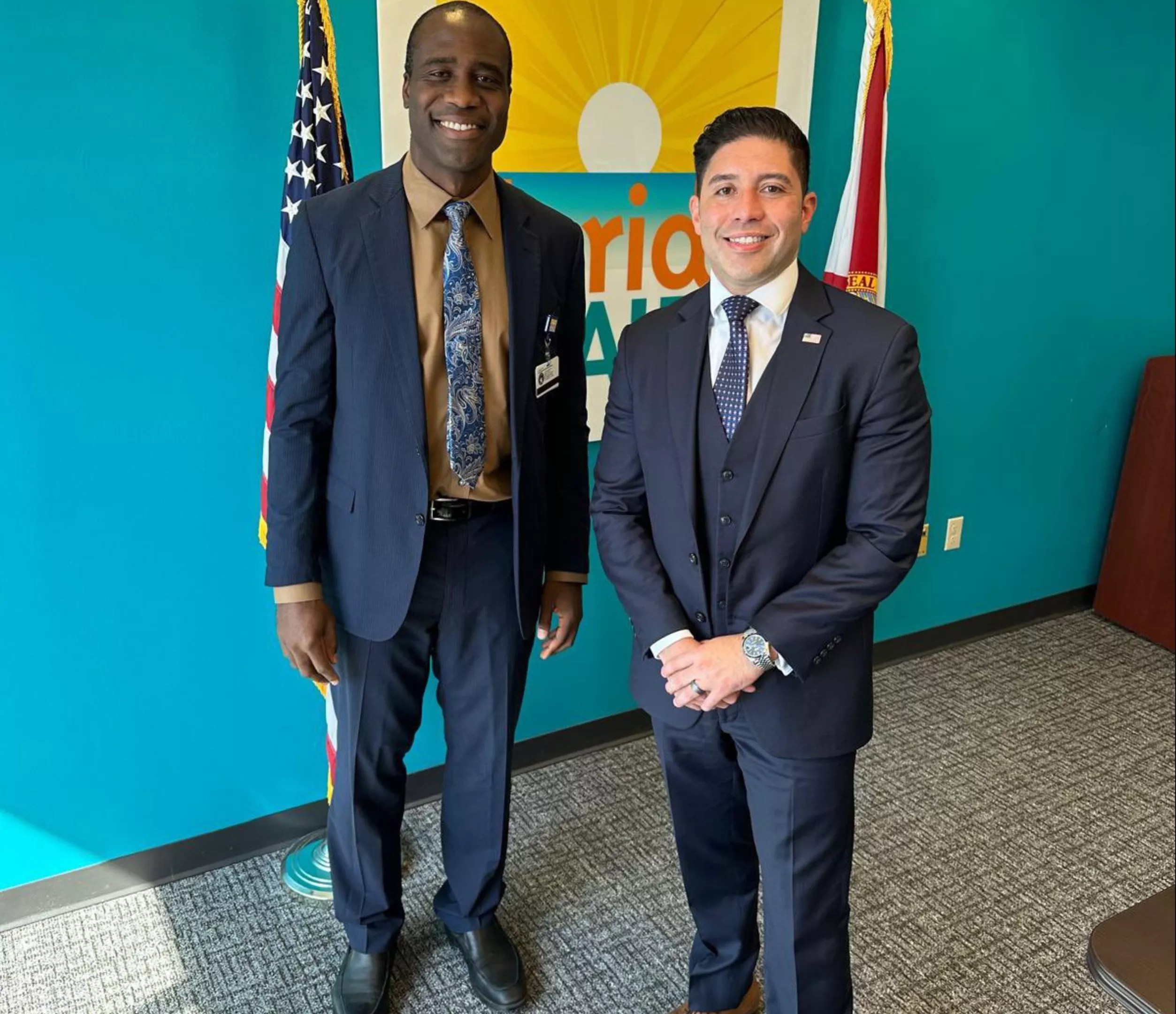 Joseph Ladapo (left) stands next to Roberto Gonzalez at the Florida Department of Health building