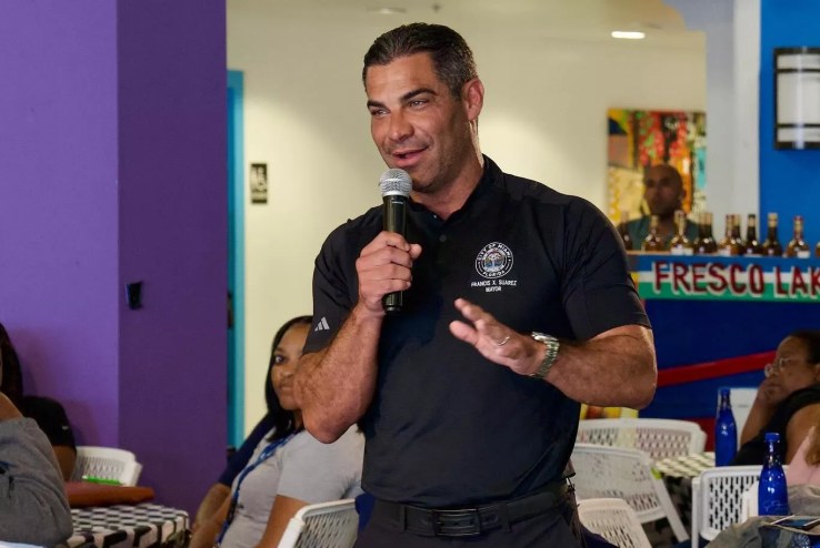 City of Miami Mayor Francis Suarez speaks into a microphone.