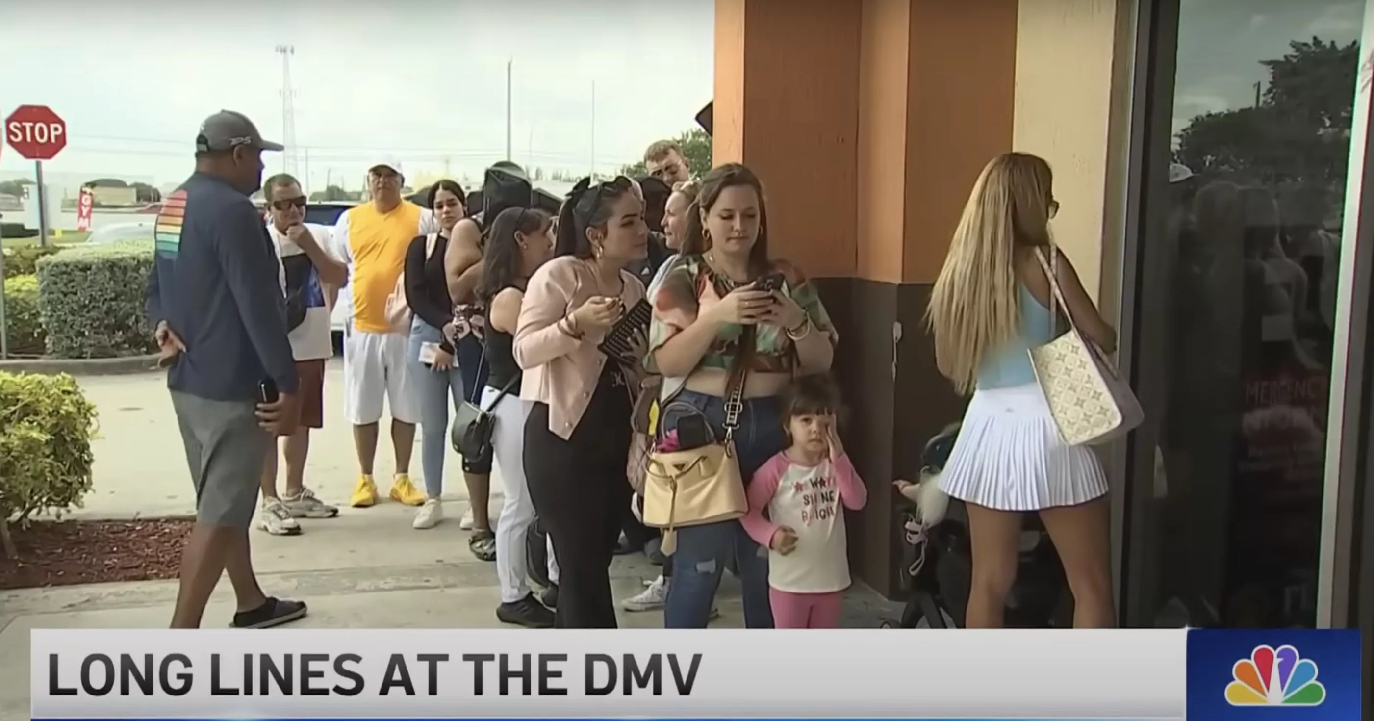 Screenshot of NBC6 broadcast of people waiting line at DMV.