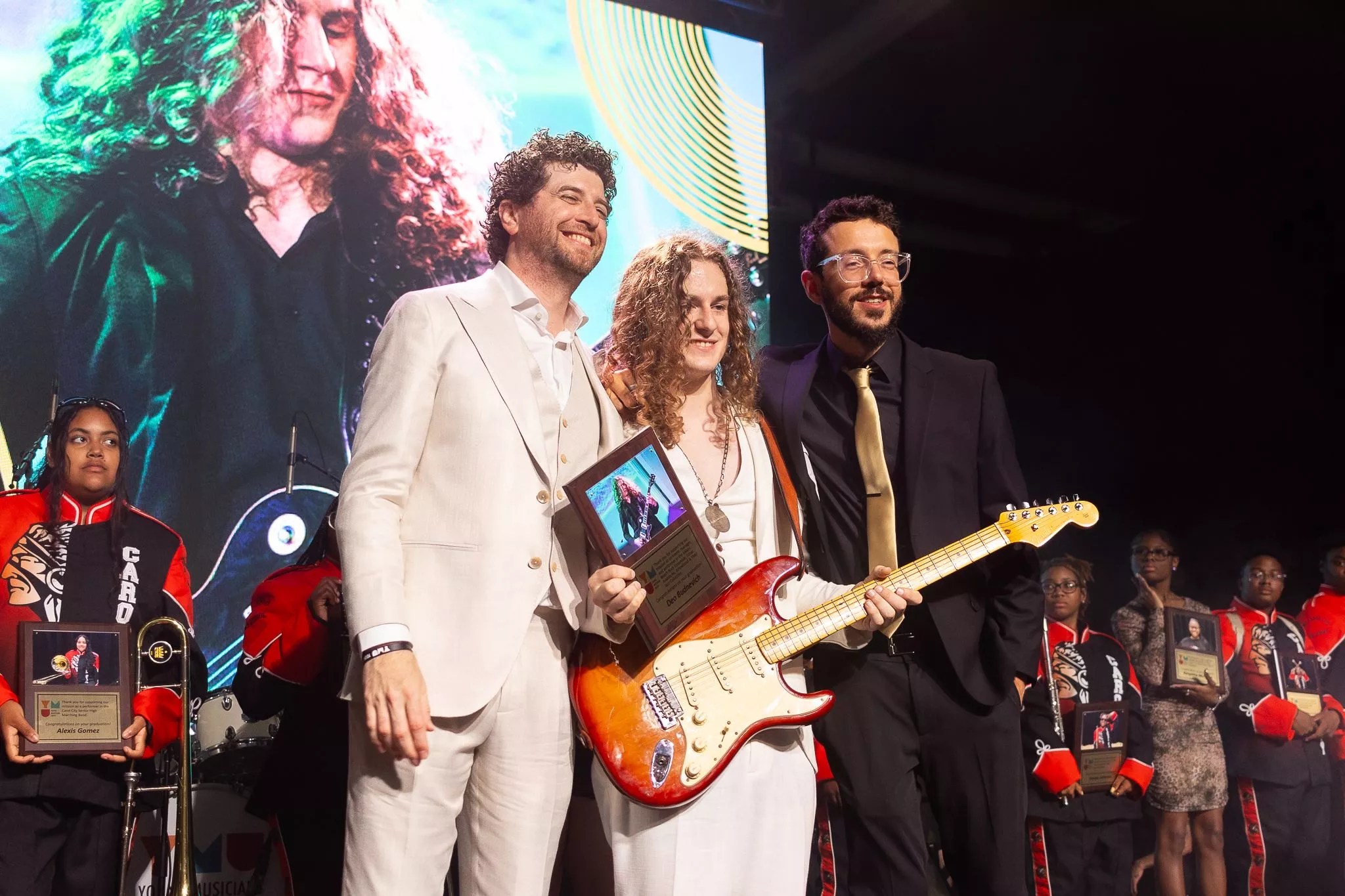 Sammy Gonzalez Zeira on stage with Deo Budnevick and Zach Larmer