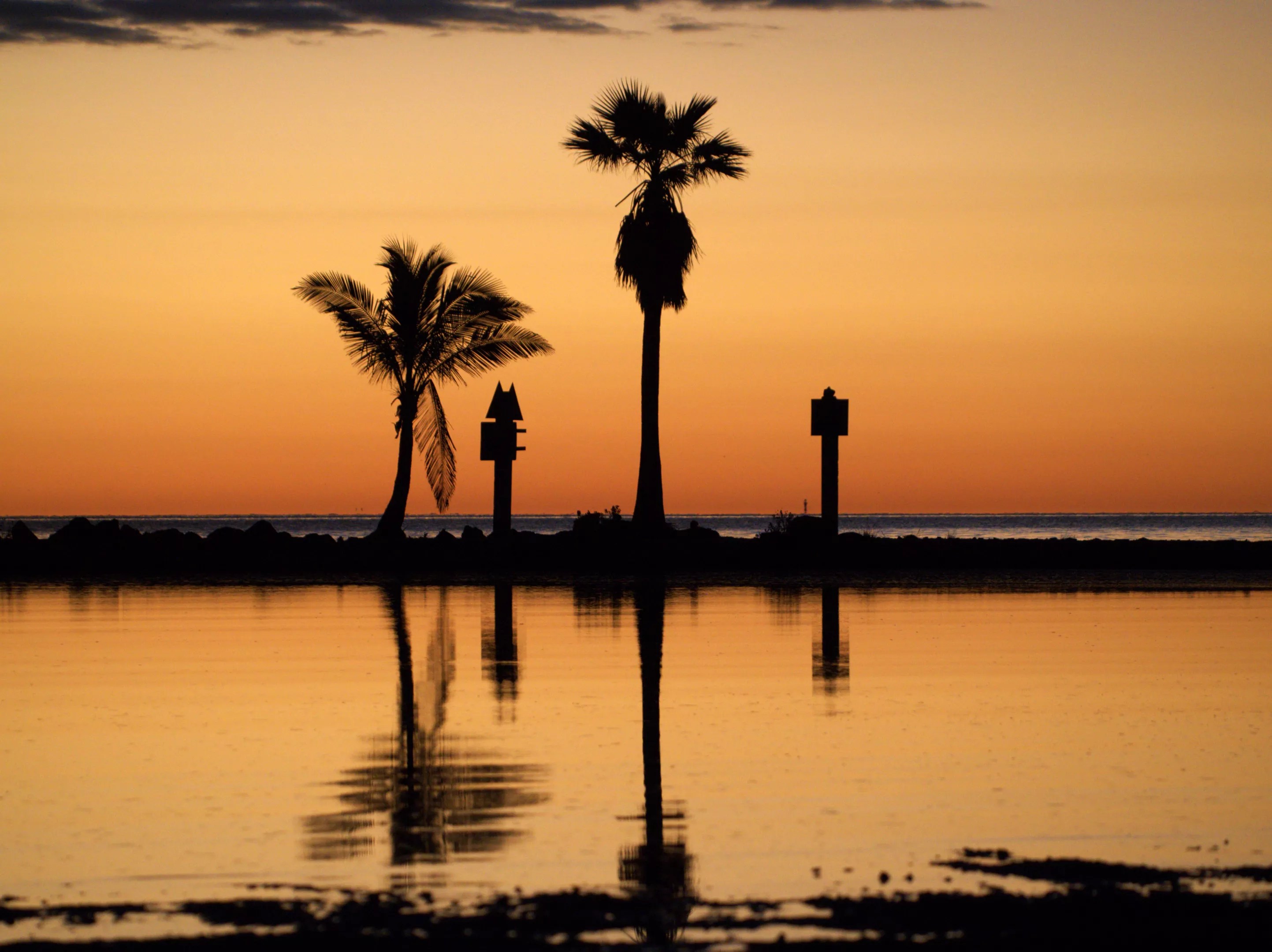 Looking across the swimming inlet at Matheson Hammock Park in Miami towards Biscayne Bay just before sunrise