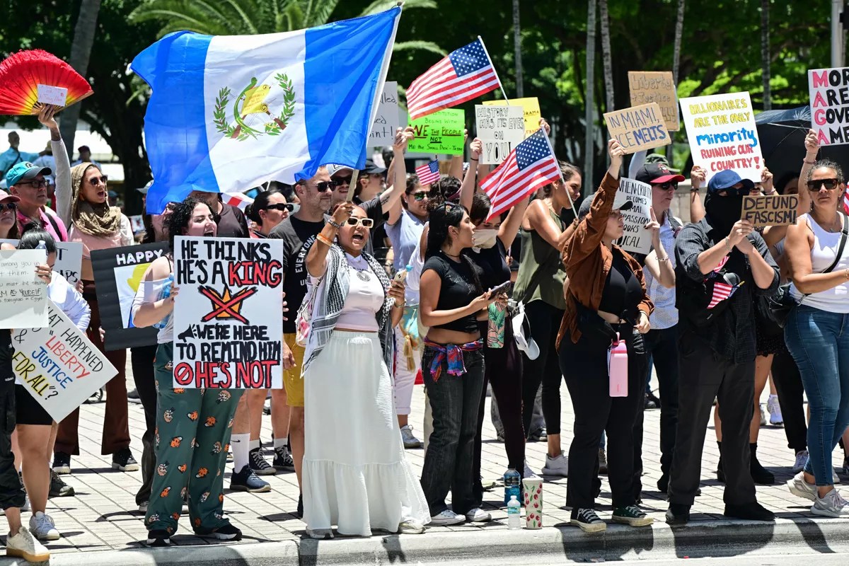 Protesters in Miami rally against President Donald Trump policy decisions.