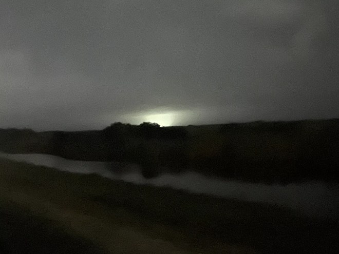 Big Cypress from a distance, illuminated by the newly built Alligator Alcatraz.