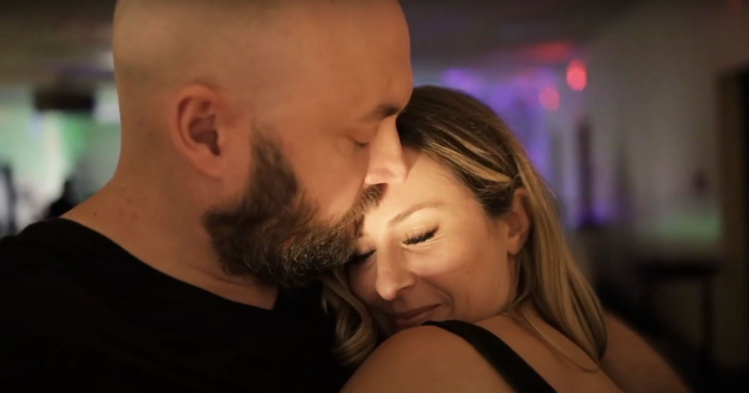 A photo of Jacob Bickelhaupt and Nadia Bickelhaupt embracing.