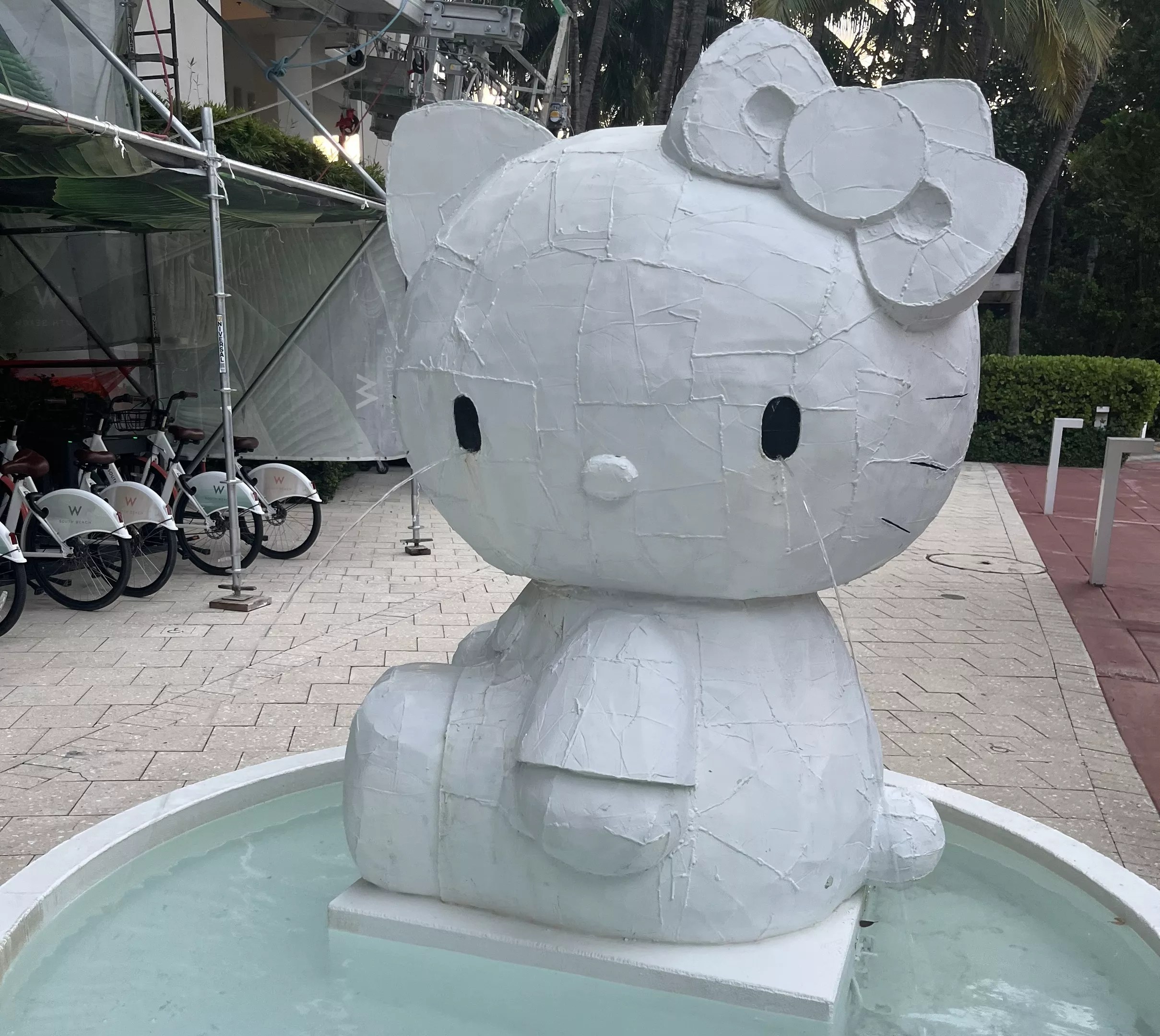 a Hello Kitty fountain with water pouring out of its eyes