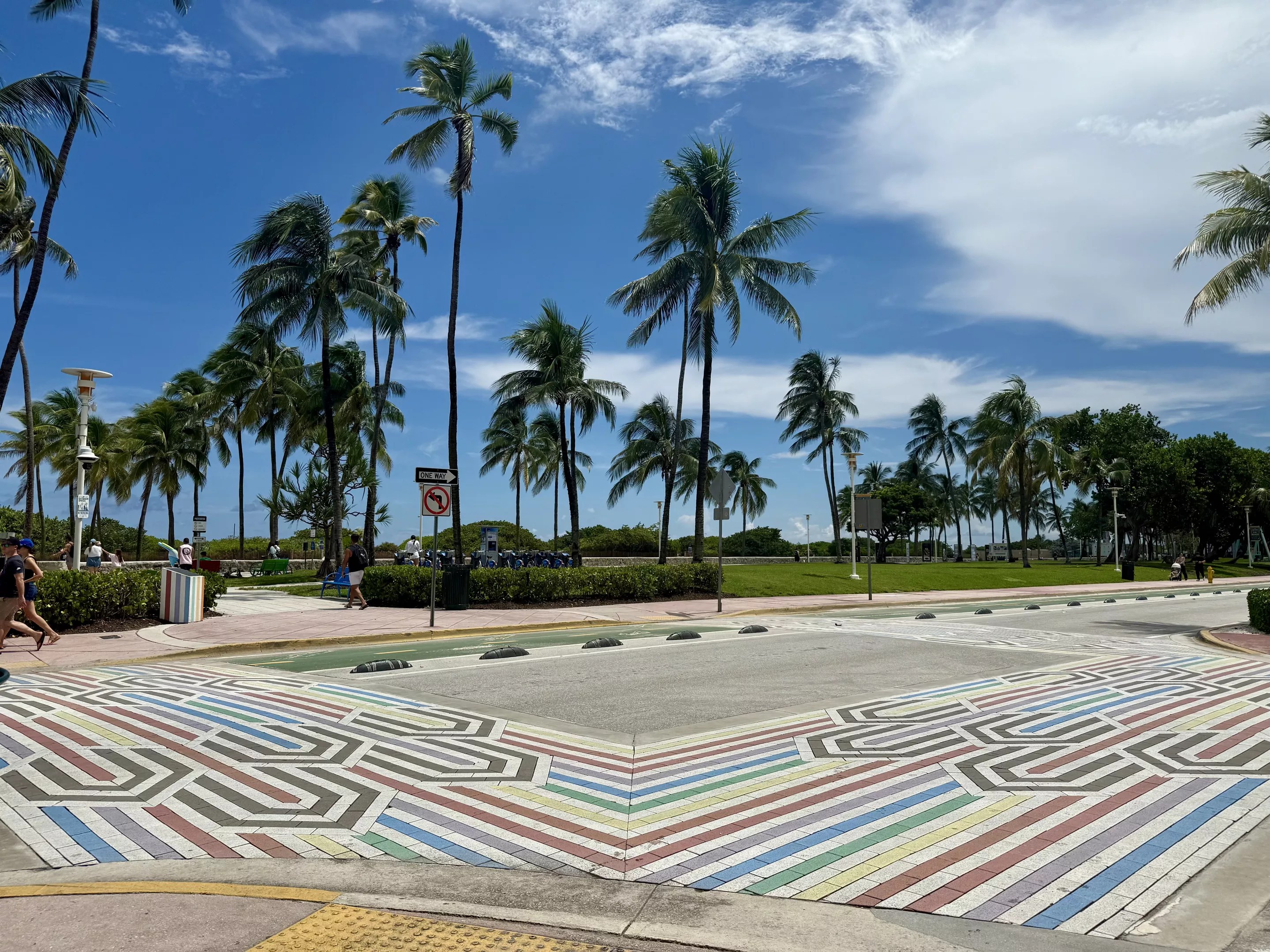 Depicted are rainbow crosswalks at the intersection of Ocean Drive and 12th Street.