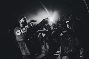 Picture of Eladio Carrion performing in front of fans.